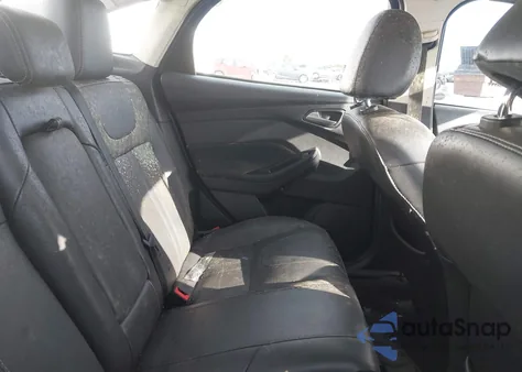 2014 Ford Focus Titanium z USA, uszkodzony, nr VIN 1FADP3J20EL132573